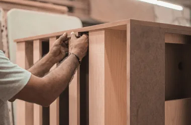 Assembling wooden furniture in workshop