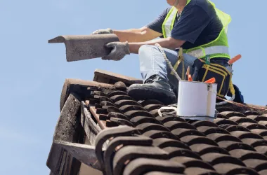 Roof repair with safety gear and tools
